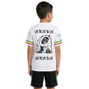 Conjunto infantil fútbol Ajax temporada 2025 2026 edición Bob Marley camiseta blanca y pantalón negro técnica transpirable ninos
