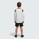 Conjunto infantil Alemania primera equipación 2026 2027 niños kit completo camiseta blanca y pantalón negro oficial DFB fútbol niños 26/27 Mundial 2026.
