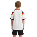 Conjunto infantil Alemania primera equipación 2026 2027 niños kit completo camiseta blanca y pantalón negro oficial DFB fútbol niños 26/27 Mundial 2026.