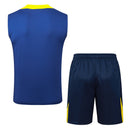 Conjunto hombre entrenamiento Atlético de Madrid temporada 2025 2026 camiseta sin mangas púrpura pantalón corto azul marino técnica transpirable colchonero oficial.