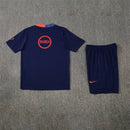 Conjunto hombre FC Barcelona entrenamiento 2025 2026 camiseta azul marino detalles naranja y pantalón corto oficial fútbol culé 25/26 transpirable pro.