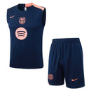Conjunto hombre entrenamiento FC Barcelona temporada 2025 2026 camiseta sin mangas azul marino pantalón corto naranja técnica transpirable culé oficial.