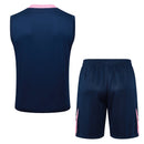 Conjunto hombre entrenamiento pré-juego FC Barcelona temporada 2025 2026 camiseta sin mangas azul marino pantalón corto naranja técnica transpirable culé oficial pre-match.