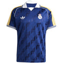 Camiseta polo hombre Real Madrid Originals temporada 2026 2027 oficial azul marino casual técnica La Liga estilo retro galáctico.