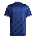 Camiseta polo hombre Real Madrid Originals temporada 2026 2027 oficial azul marino casual técnica La Liga estilo retro galáctico.