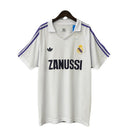 Camiseta hombre Real Madrid temporada 1984 1985 primera equipación blanca cuello polo retro calidad 1.1 premium Quinta del Buitre Tienda Hincha Futbolero. Real Madrid 1984, Real Madrid 1985, Camiseta Madrid blanca, Ropa Real Madrid retro, Camiseta Madrid 80s, Calidad 1.1 Madrid, Butragueño 85, Tienda Hincha Futbolero, Real Madrid Retro Jersey 84/85.