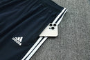 Chándal hombre Real Madrid temporada 2025 2026 chaqueta cortaviento blanca y pantalón negro entrenamiento calidad 1.1 premium oficial madridista. Real Madrid 2025, Cortaviento Real Madrid blanco, Chándal Madrid negro, Ropa Real Madrid barata, Entrenamiento Madrid 25/26, Calidad 1.1 Real Madrid, La Liga Gear, Tienda Hincha Futbolero, Real Madrid Windbreaker.