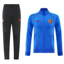 Chándal hombre Manchester United temporada 2025 2026 conjunto sudadera azul y pantalón largo negro calidad 1.1 premium oficial.