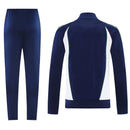 Chándal hombre Real Betis temporada 2025 2026 conjunto completo chaqueta y pantalón azul marino oficial fútbol bético elegante premium.