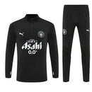 Conjunto entrenamiento hombre Manchester City temporada 2025 2026 oficial negro sudadera y pantalón técnica transpirable pro premier league.