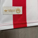 POLO OLIMPIACOS 100 YEARS 25/26 HOMBRE - TIENDA HINCHA FUTBOLERO