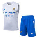 Conjunto hombre entrenamiento Real Madrid temporada 2025 2026 camiseta sin mangas blanca pantalón corto azul técnica transpirable oficial merengue white blue.