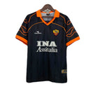 Camiseta de la AS Roma 1999 2000 segunda equipación retro negra de hombre con detalles giallorossi y cuello redondo jersey vintage de Taffarel Tienda Hincha Futbolero Totti, Camiseta Roma 1999 retro, Jersey AS Roma antiguo negro, Camiseta Roma clásica hombre, Camiseta histórica Roma 2000, Comprar equipación vintage Roma, Calidad retro premium 1.1, Camiseta fútbol italiana negra, Ropa urbana blockecore, Jersey de colección Francesco Totti.