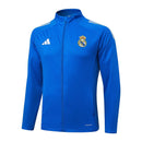 Sudadera hombre Real Madrid temporada 2025 2026 color azul oficial fútbol merengue técnica transpirable entrenamiento urbana azul marino.