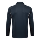 Sudadera hombre Real Madrid temporada 2025 2026 color gris oscuro oficial fútbol merengue técnica transpirable entrenamiento urbana antracita.